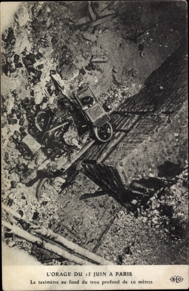 Postcard Storm in Paris, taxi in ruins at the bottom of a 10 meter deep hole
