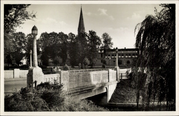 Postcard Pritzwalk in the Prignitz, Hindenburg Bridge, furniture factory of A. Schaade