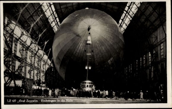 PC Friedrichshafen on Lake Constance, airship Graf Zeppelin, LZ 127, brought into the hall, spectators