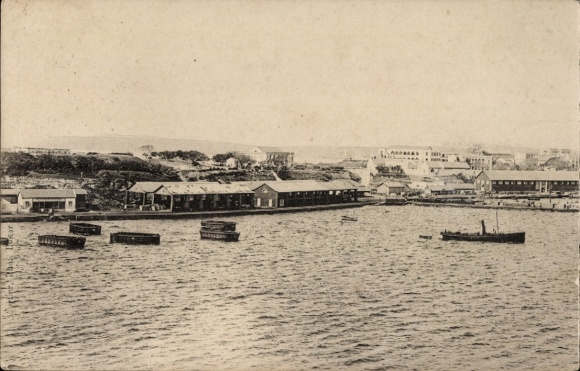 Ak Dakar Senegal, Hafenansicht, Boote im Wasser, Gebäude am Ufer, Senegal