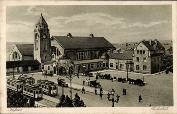 Ak Gießen an der Lahn Hessen, Bahnhof, Straßenbahnen