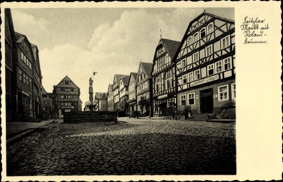 Postcard Fritzlar in the Schwalm Eder district, market with Roland fountain, Gasthof Prägel, half-timbered houses