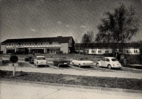 Postcard Rhynern Hamm in Westphalia, front view of a hotel, cars parked, clear skies, quiet surroundings