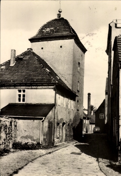 Postcard Bischofswerda in Saxony, photograph of an old tower, cobbled street, renovated houses,