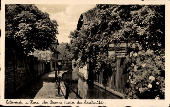Postcard Osterwieck am Harz, historical town view, quiet canal, old buildings, trees