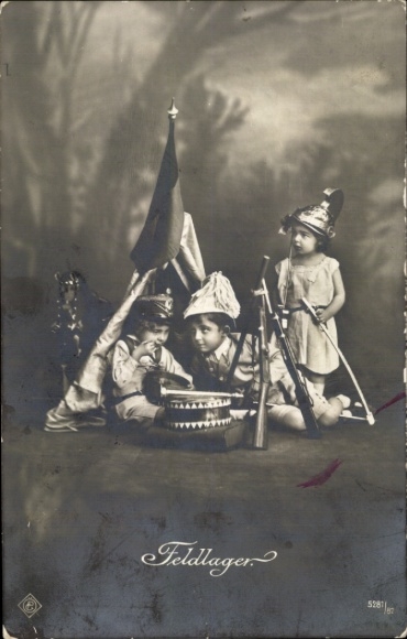 Postcard field camp, children play soldiers, helmets, weapons, flag, drum