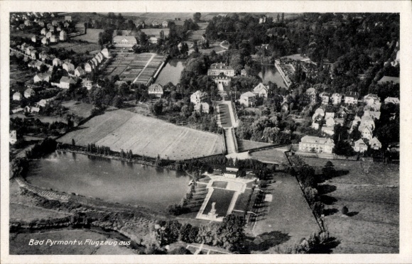 Postcard Bad Pyrmont in Lower Saxony, aerial view of residential buildings, parks, landscape