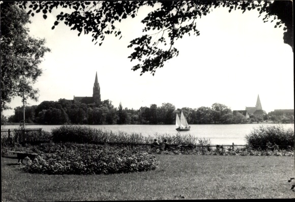 Postcard Röbel on the Müritz, beautiful view of water, churches and trees, sailboat on the water