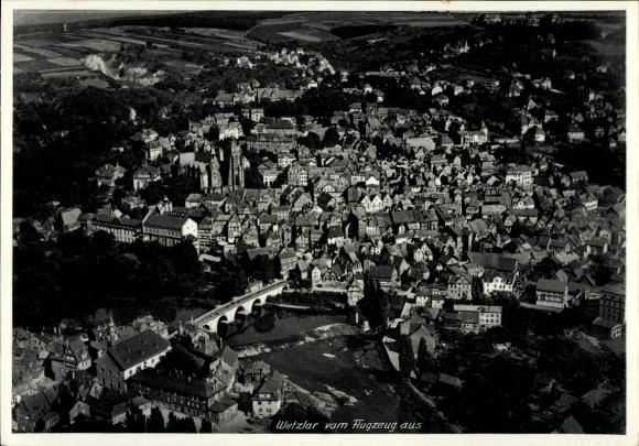 Postcard Wetzlar an der Lahn, Wetzlar from the plane, black and white, divided by the Lahn, left ...