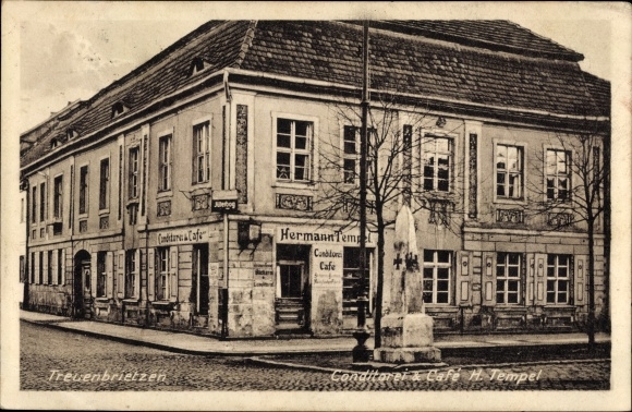 Postcard Treuenbrietzen in Brandenburg, confectionery cafe, war memorial