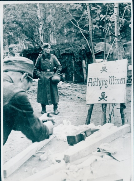 Photo German Wehrmacht, Eastern Front, carpenter manufactures information boards, caution mines, II WW