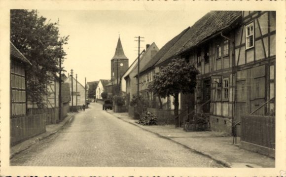 Photo Postcard Friedrichsdorf im Taunus, street area, church