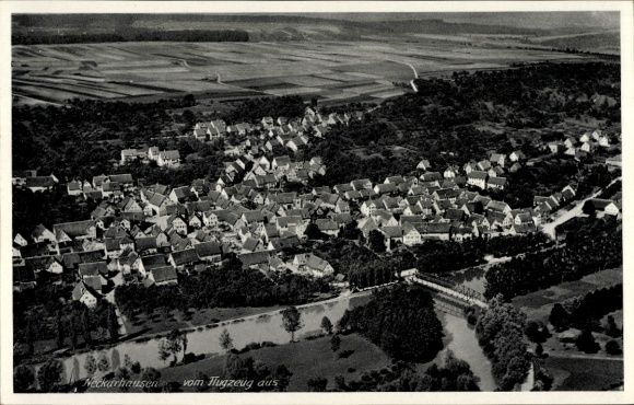 Ak Neckarhausen in Baden, Luftaufnahme von  Häuser, Fluss, Felder