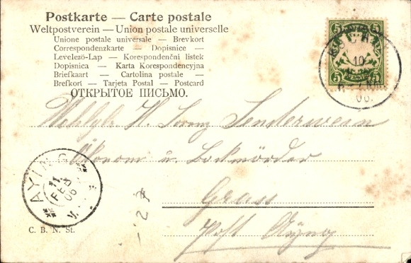 Postcard hunter cleans his rifle, hunting dog, pipe