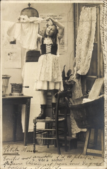 Postcard girl hanging up the laundry