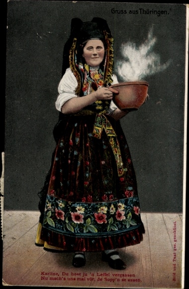 Postcard woman in traditional costume with soup bowl