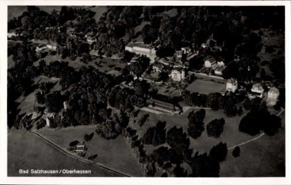 Postcard Bad Salzhausen Nidda in Hesse, aerial view of numerous trees, buildings, quiet landscape