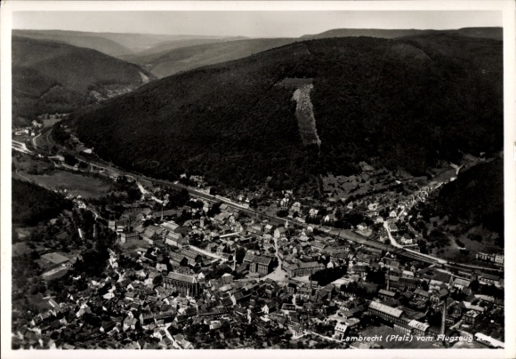 Postcard Lambrecht in the Palatinate, aerial photograph from airplane view, mountains and town