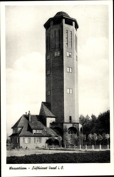 Postcard Varel am Jadebusen, street section with a view of the water tower