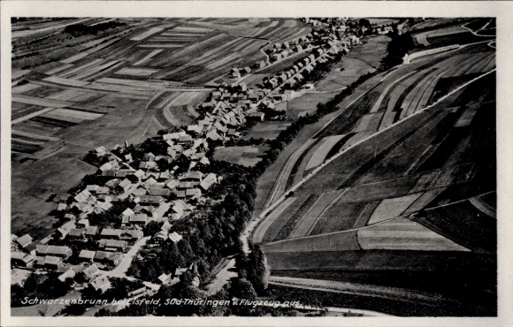 Postcard Schwarzenbrunn Sachsenbrunn in Thuringia, aerial photograph, view of the village and surroundings