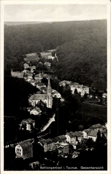 Aerial photograph of Schlangenbad in the Taunus Mountains in Hesse, aerial photograph of Schlangenbad, church, houses in the valley, forest in...