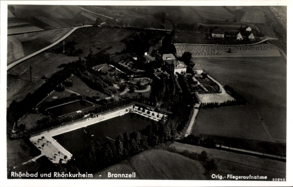 Postcard Bronnzell Fulda in East Hesse, Rhönbad, Rhönkurheim, aerial photograph