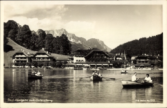 Postcard village of Königsee Königssee Upper Bavaria, partial view with Untersberg, rowing boats