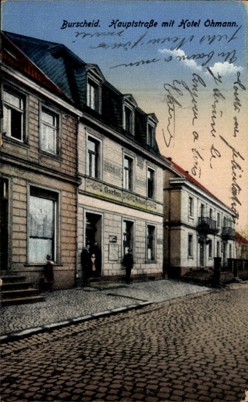 Postcard Burscheid in North Rhine Westphalia, main street with Hotel Ohmann, cobbled street, people