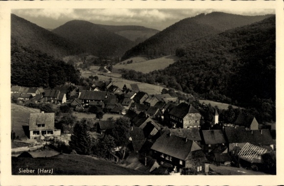 Ak Sieber Herzberg am Harz, panoramisch uitzicht op Sieber, Harz, historische huizen, bergen