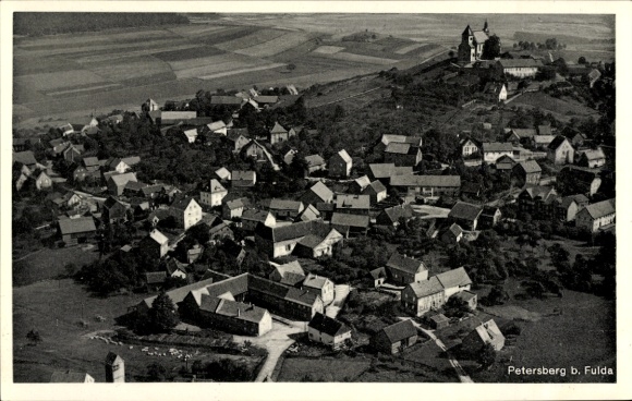 Postcard Petersberg (near Fulda) Hesse, aerial view of Petersberg, many houses, hilly landscape
