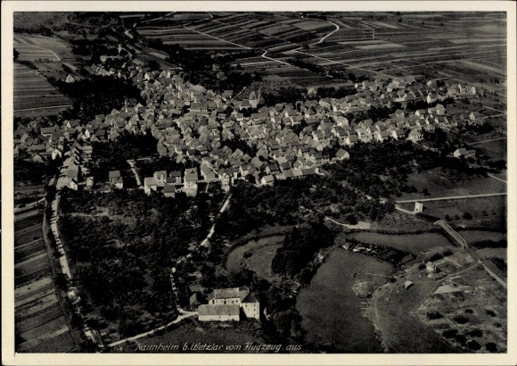 Postcard Naunheim Wetzlar an der Lahn, aerial view of Naunheim, many houses, rural surroundings