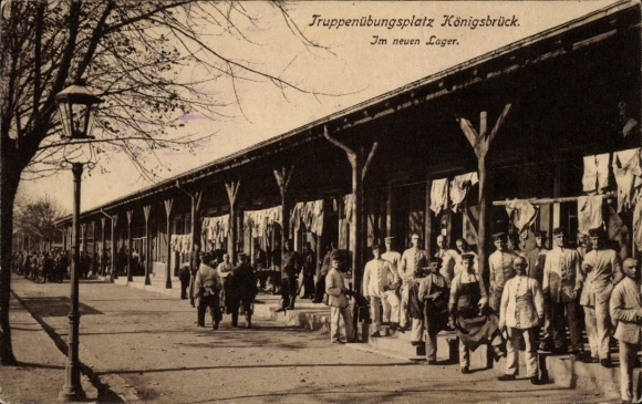 Postcard Königsbrück in Upper Lusatia, military training area, buildings with soldiers, laundry, trees