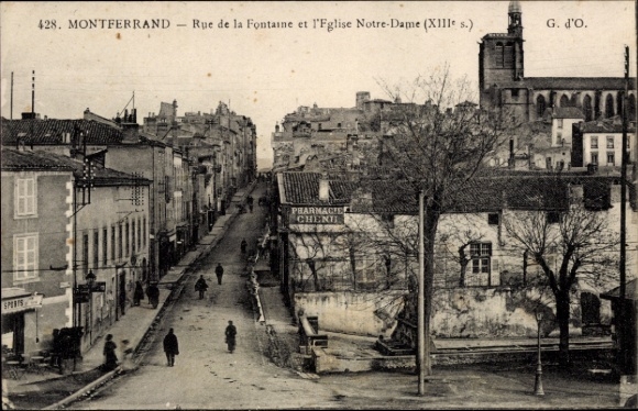 Montferrand Gironde, street with houses, Notre-Dame Church, pharmacy, snow-covered trees