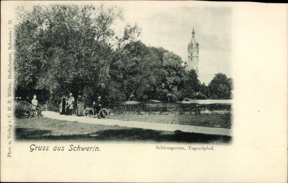 Ak Schwerin in Mecklenburg, Gruss aus  Schlossgarten, Tugendpfad, Menschen, Bäume, Turm