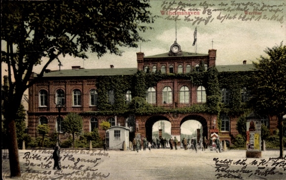 Postcard Wilhelmshaven in Lower Saxony, shipyard gate, advertising column