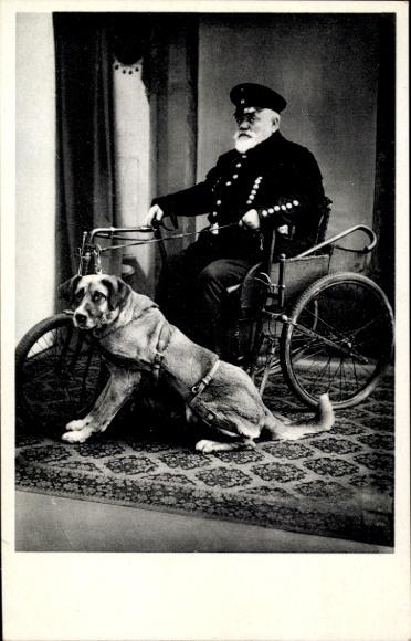 Postcard war veteran in wheelchair, disabled dog
