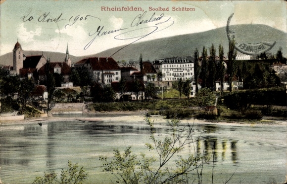 Ak Rheinfelden in Baden, Rheinfelden am Fluss, Soolbad Schützen, Berge im Hintergrund, farbige An