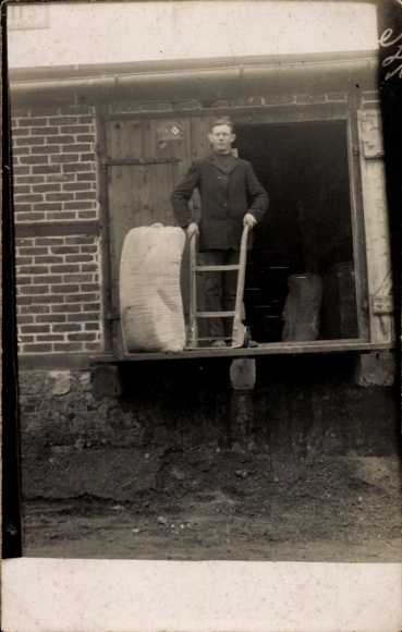Photo Postcard Man with cart, sack, stable
