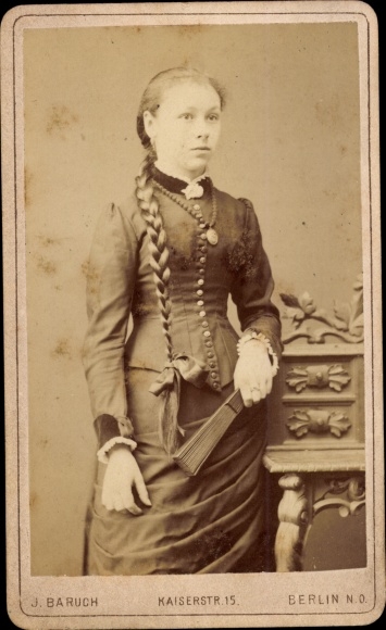 CdV portrait of a woman, lady with a fan, braided plait