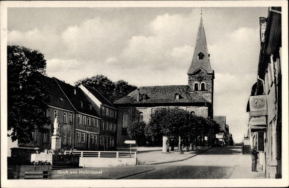 KP Holzappel Nadrenia-Palatynat, częściowy widok z kościołem, sklepem, pomnikiem