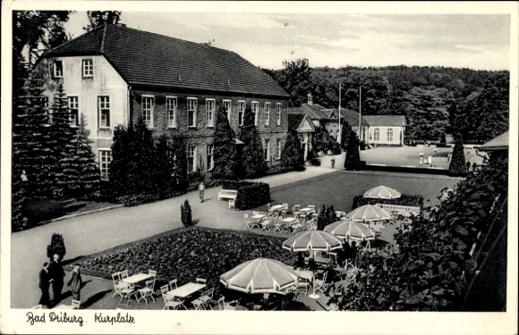 Postcard Bad Driburg in Westphalia, spa park, building, garden landscape, tables and chairs