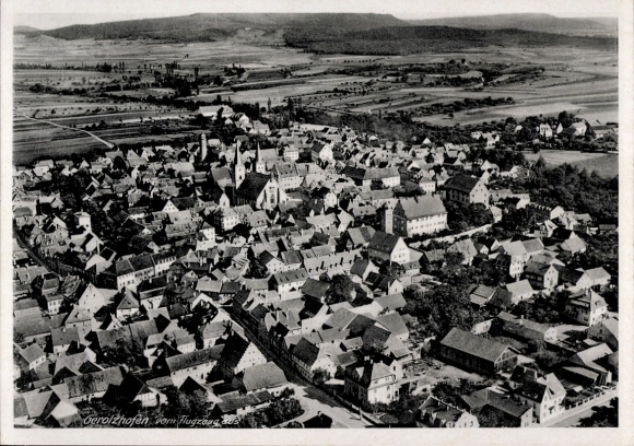 Postcard Gerolzhofen in Lower Franconia, aerial view of many houses, wide landscape