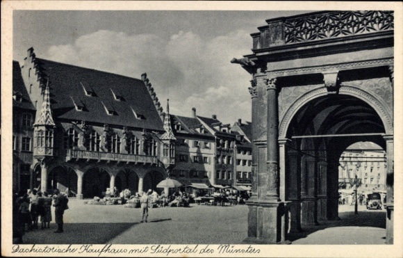 Ak Freiburg im Breisgau, historisches Kaufhaus mit Südportal des Münsters