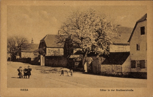 Ak Riesa an der Elbe Sachsen,  Güter in der Meißnerstraße, Kinder auf der Straße, Bäume, Häuser