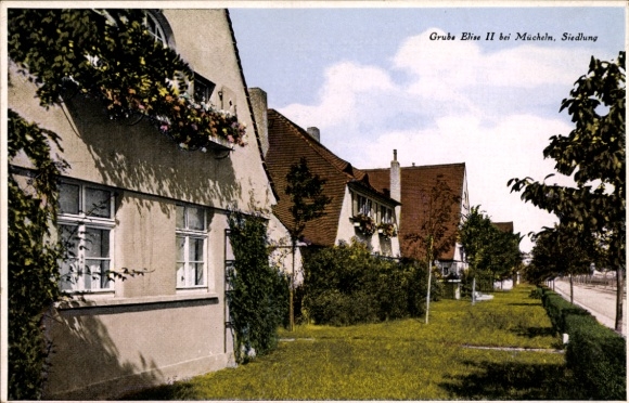 Ak Mücheln im Saalekreis, Grube Elise II, Siedlung, ruhige Straßenansicht, blühende Fenster, hell