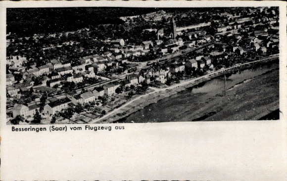 Postcard Besseringen Merzig in Saarland, aerial view of Besseringen, Saar, houses, street