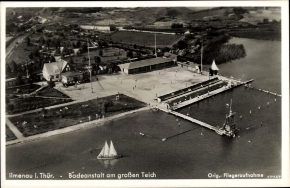Postcard Ilmenau in Thuringia, aerial view of the swimming pool, large pond, sailboats, people in the water