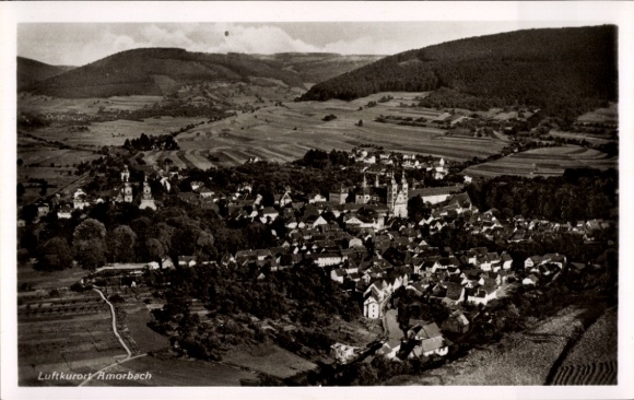 Postcard Amorbach in the Odenwald Lower Franconia, aerial view of the village, churches, green landscape, buildings