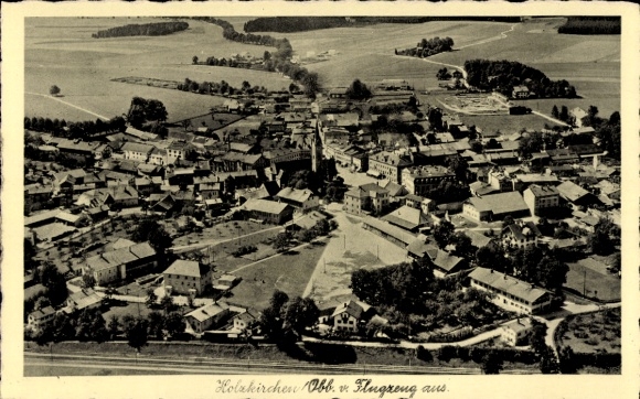Postcard Holzkirchen in Upper Bavaria, aerial view of many houses, wide fields