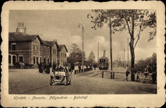Postcard Novi Sad Újvidék Neusatz Serbia, train station and tram